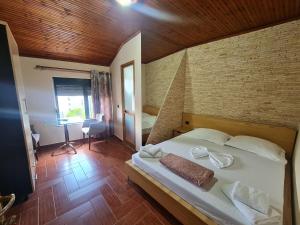 Postel nebo postele na pokoji v ubytování Hotel La Villa