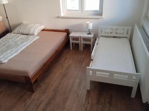 Postel nebo postele na pokoji v ubytování Chalupa Na Polní
