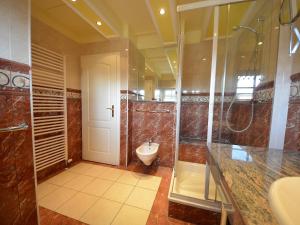 Koupelna v ubytování Holiday Home Strandhafer by Interhome