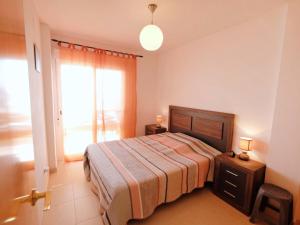 Posteľ alebo postele v izbe v ubytovaní Apartment Ona de Mar by Interhome + 7 fotografií