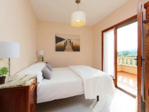 Posteľ alebo postele v izbe v ubytovaní Holiday Home Mas Rovira 8 by Interhome