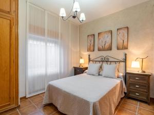 Posteľ alebo postele v izbe v ubytovaní Holiday Home Villa San Vicente by Interhome + 16 fotografií