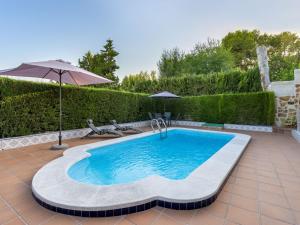 Bazén v ubytovaní Holiday Home Villa San Vicente by Interhome alebo v jeho blízkosti
