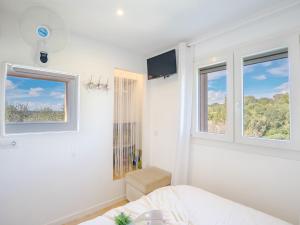 Postel nebo postele na pokoji v ubytování Holiday Home Sa Font by Interhome