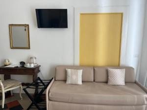 TV a/nebo společenská místnost v ubytování B&B Chimera Bari