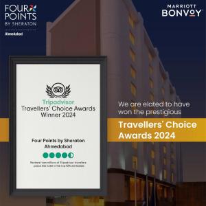 Certificado, premio, señal o documento que está expuesto en Four Points by Sheraton Ahmedabad