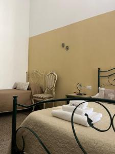 Postel nebo postele na pokoji v ubytování B&B Chimera Bari