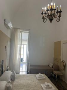 Postel nebo postele na pokoji v ubytování B&B Chimera Bari