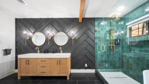 a bathroom with a sink and two mirrors at Tranquil Country Escape 4 Bedrooms Pond Firepit in Greenville +40 photos
