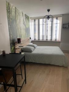 Postel nebo postele na pokoji v ubytování Studio laita