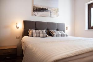 Postel nebo postele na pokoji v ubytování Apartments Deak