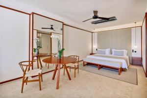 Cama ou camas em um quarto em Live Aqua Punta Cana - All Inclusive - Adults Only