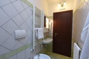 Koupelna v ubytování Casa Vacanze Dalisa Ulivo B con Parcheggio