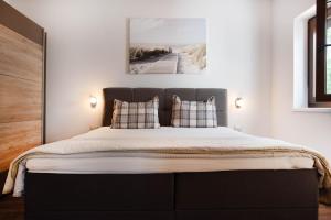 Postel nebo postele na pokoji v ubytování Apartments Deak