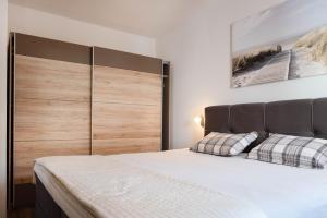 Postel nebo postele na pokoji v ubytování Apartments Deak
