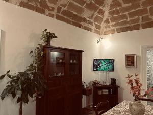 TV a/nebo společenská místnost v ubytování Giovanna Home