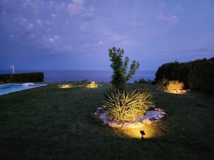 A garden outside Private Villa 102 with heated pool in BlackSeaRama