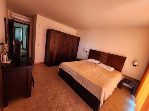 A bed or beds in a room at Private Villa 102 with heated pool in BlackSeaRama