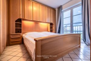 a bedroom with a bed and a large window at Stein W03 in Stein