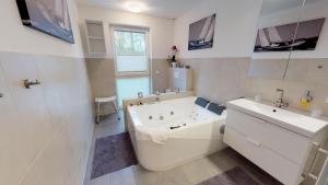 Vannituba majutusasutuses Haus Friedrichstr. 16a +38 fotot