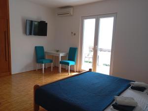 TV a/nebo společenská místnost v ubytování Guesthouse Lisica