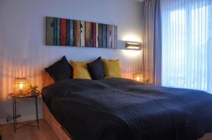 Ένα ή περισσότερα κρεβάτια σε δωμάτιο στο Strandhotel 1