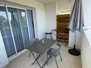 Posezení v ubytování T2 neuf vue mer, piscine chauffée N194