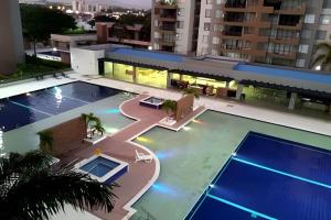 Tenis a/nebo squash v ubytování Relax en Ricaurte, Jacuzzi privado, 94 Mts nebo okolí
