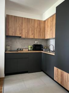 Kuchyň nebo kuchyňský kout v ubytování OpenView Apartment