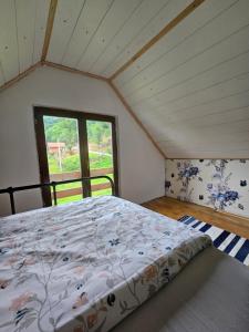 Tempat tidur dalam kamar di Pravo mesto