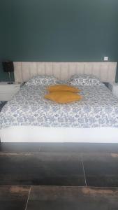 Postel nebo postele na pokoji v ubytování B&B Camacha Porto Santo