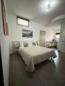 Postel nebo postele na pokoji v ubytování Biscotti s room