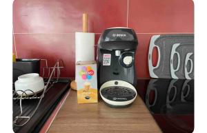 a coffee maker sitting on top of a counter at TopTravel-LKW Parkplatz in Bad Hersfeld
