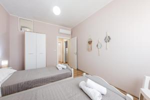 Postelja oz. postelje v sobi nastanitve The Bohemian Pad