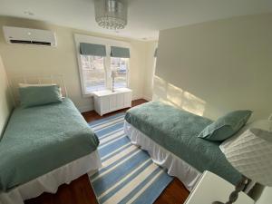 Ένα ή περισσότερα κρεβάτια σε δωμάτιο στο The Inn at Palmetto