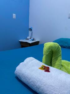 Кровать или кровати в номере Cabinas Mitchaelle's