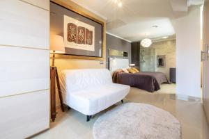 Posteľ alebo postele v izbe v ubytovaní Casa junto al mar con jardín