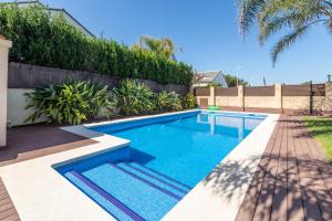 Bazén v ubytovaní Casa junto al mar con jardín alebo v jeho blízkosti
