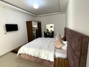 Postel nebo postele na pokoji v ubytování Espaço Ru-B