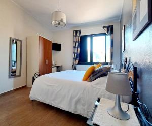 A bed or beds in a room at B&B Domu Mea