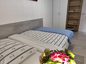 Postel nebo postele na pokoji v ubytování Apartman Nino
