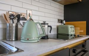 Køkken eller tekøkken på The Poets Cottage