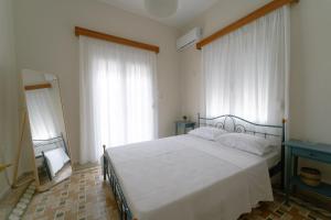 Postel nebo postele na pokoji v ubytování Selene house
