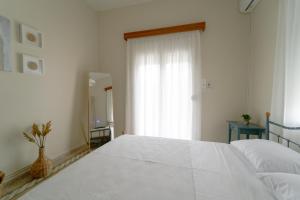 Postel nebo postele na pokoji v ubytování Selene house