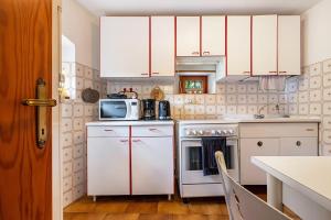 Kuchyň nebo kuchyňský kout v ubytování CASA LUISA