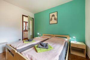 Postel nebo postele na pokoji v ubytování CASA LUISA