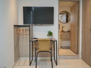 TV a/nebo společenská místnost v ubytování Elemont Hotel