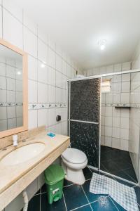 Bilik mandi di Casa Espaçosa com quintal interno +17 gambar