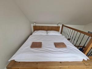 Postel nebo postele na pokoji v ubytování Restaurace - Apartmány Bobule