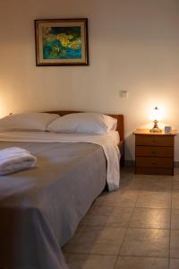 Кровать или кровати в номере Makri Beach Villa